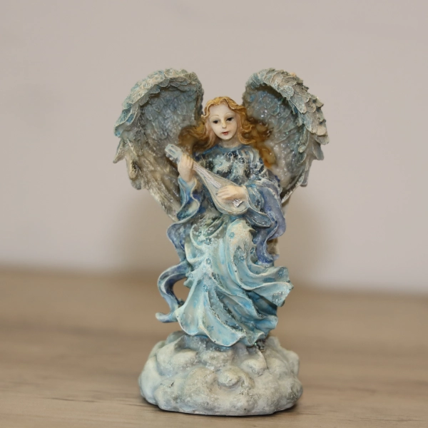 Cleaned angel figurine after restoration